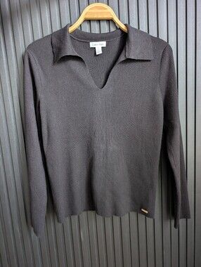 Calvin Klein black ribbed-knit polo sweater with a V-neck and collar